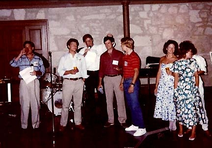 1986: Rick Cavender, Danny Pfieffer, Stan Shaw, John Parsons, Anthony Christian, and other guests